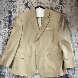 Tan sport coat. Not altered. Excellent condition